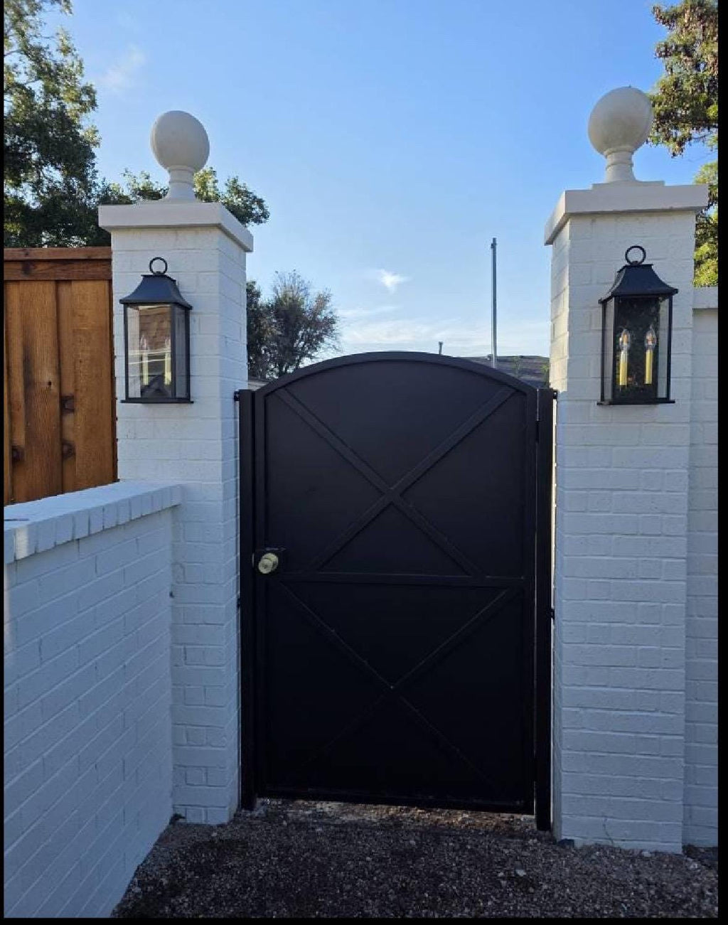 Modern Arched Iron Gate with Sheet Metal X-Panel – Custom Steel Privacy Entry