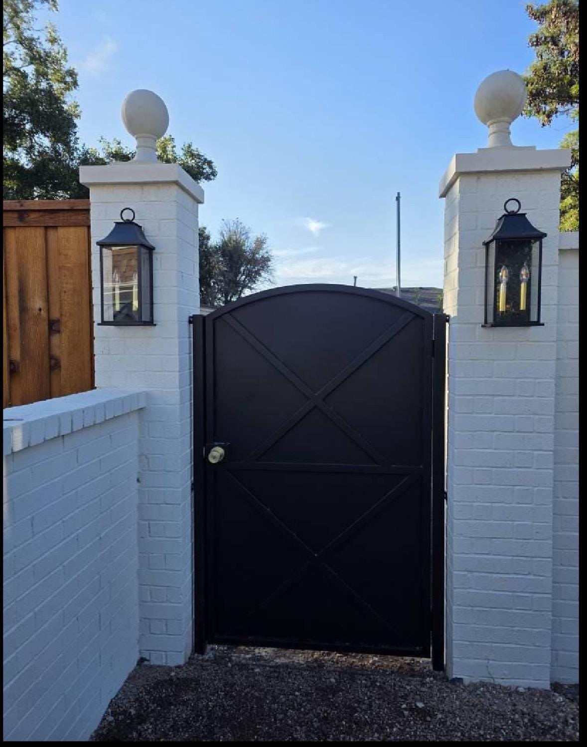 Modern Arched Iron Gate with Sheet Metal X-Panel – Custom Steel Privacy Entry